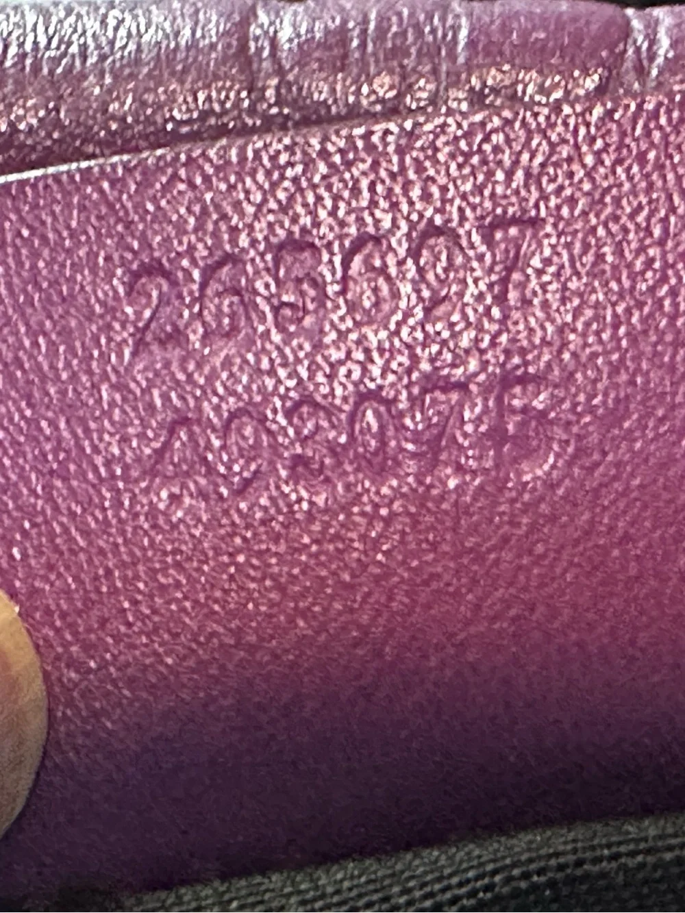 Gucci embossed leather